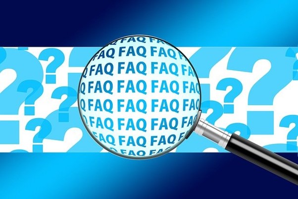 Magnifying glass graphic magnifying the word FAQ