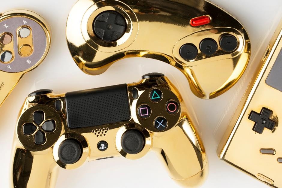 Gold plated Playstation controller, GameBoy and other gaming items