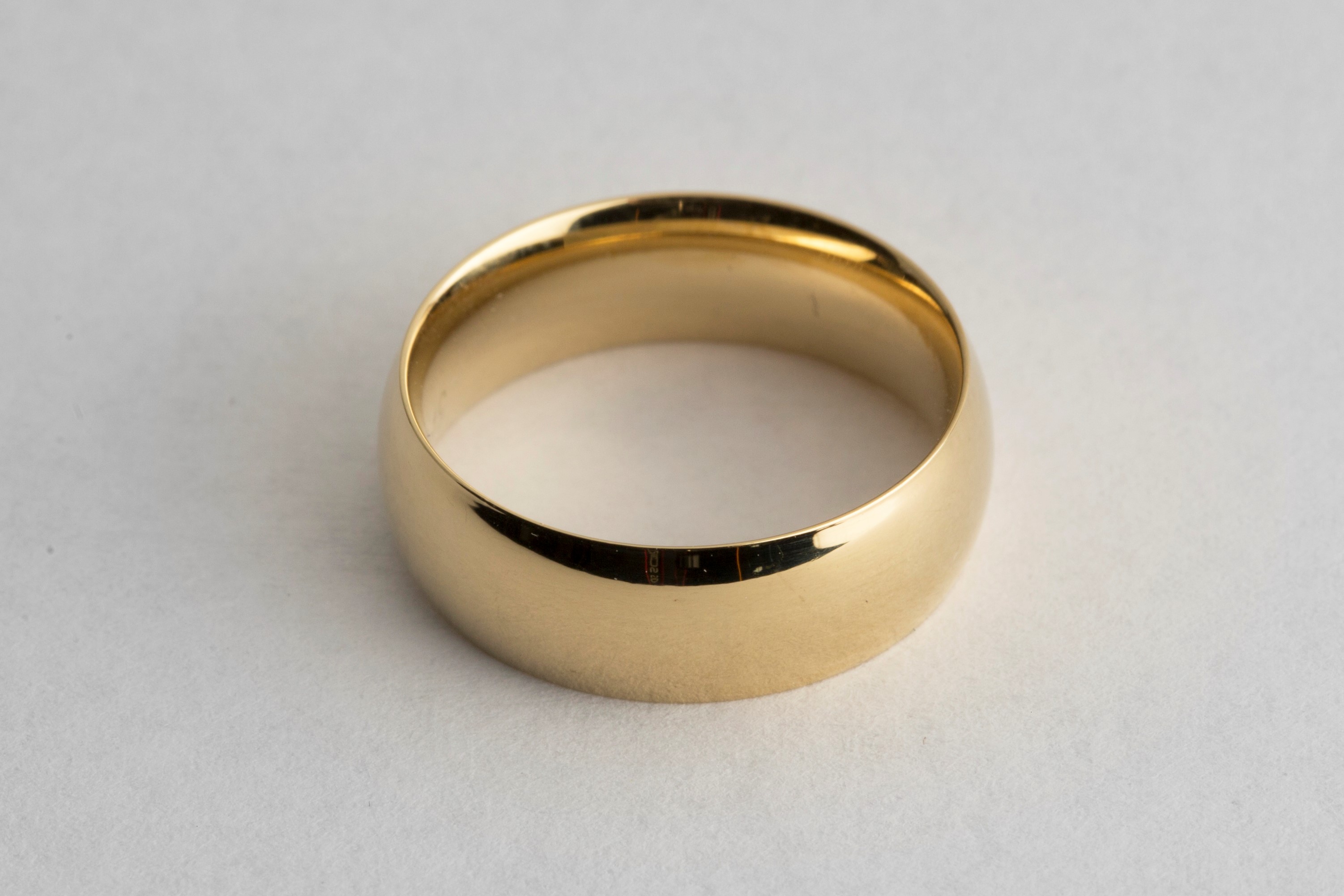 Gold wedding ring electroplated in 18k gold solution
