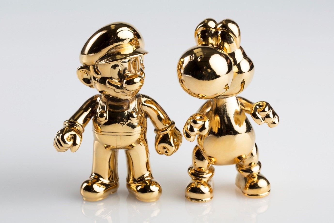 Electroformed and gold plated Super Mario and Yoshi plastictoys